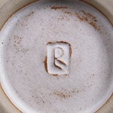 Impressed LR maker's mark on a white stoneware tall waisted vase made by Lucie Rie, circa 1975, sold at auction by Maak Contemporary Ceramics