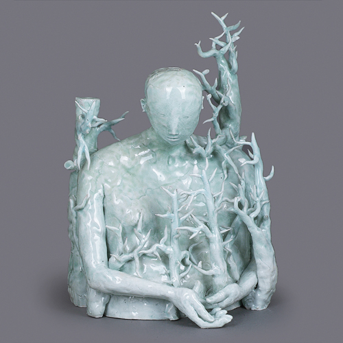 A celadon porcelain 'Figure in Branches' made by Claire Curneen in 2006 sold at auction by Maak Contemporary Ceramics