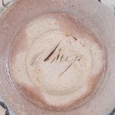 An incised signature on a bowl made by Claude Champy sold at auction by Maak Contemporary Ceramics