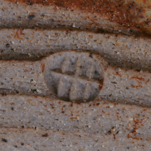 An impressed HH seal on a stoneware bowl made by Henry Hammond sold at auction by Maak Contemporary Ceramics