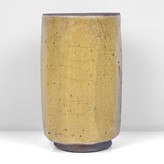 A yellow raku vase made by Inger Rokkjaer in circa 2000 sold at auction by Maak Contemporary Ceramics