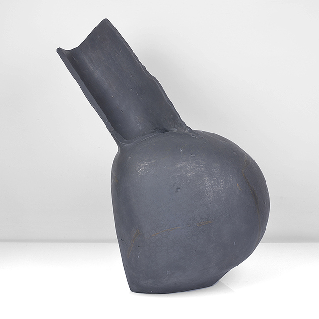 A black stoneware spout pot made by Gordon Baldwin in 1996 sold at auction by Maak Contemporary Ceramics