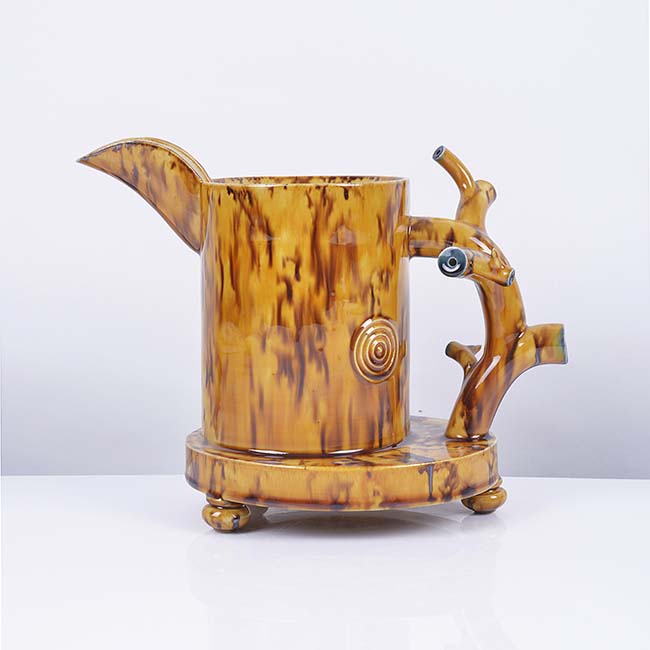 A yellow and brown earthenware jug made by Walter Keeler sold at auction by Maak Contemporary Ceramics