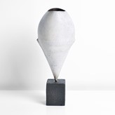 A white stoneware 'Cycladic' winged bud form made by Hans Coper in circa 1976 sold at auction by Maak Contemporary Ceramics