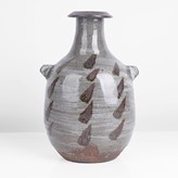 A grey stoneware bottle with lugs made by Janet Leach in circa 1975 sold at auction by Maak Contemporary Ceramics