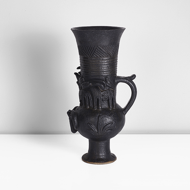 A black stoneware 'ram jug' made by Ian Godfrey in circa 1989 sold at auction by Maak Contemporary Ceramics