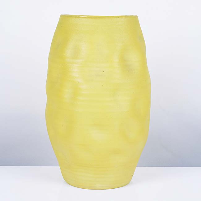 A yellow earthenware ''Small Dimpled Form' made by Nicholas Arroyave Portela in circa 1996 sold at auction by Maak Contemporary Ceramics