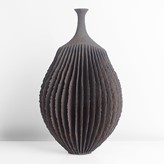 A brown stoneware flanged bottle form made by Ursula Morley-Price in circa 2002 sold at auction by Maak Contemporary Ceramics