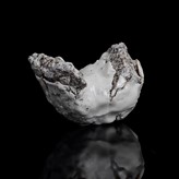 A white and grey stoneware 'Squeezed Form' made by Aneta Regal in circa 2013 sold at auction by Maak Contemporary Ceramics