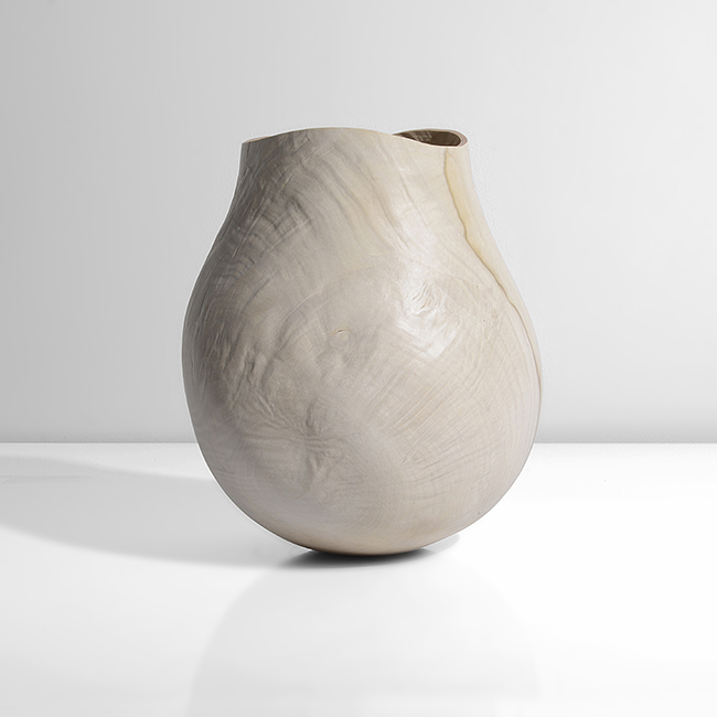 A pacific mandrone wood vessel 'White Basket 8' made by Christian Burchard in 2006