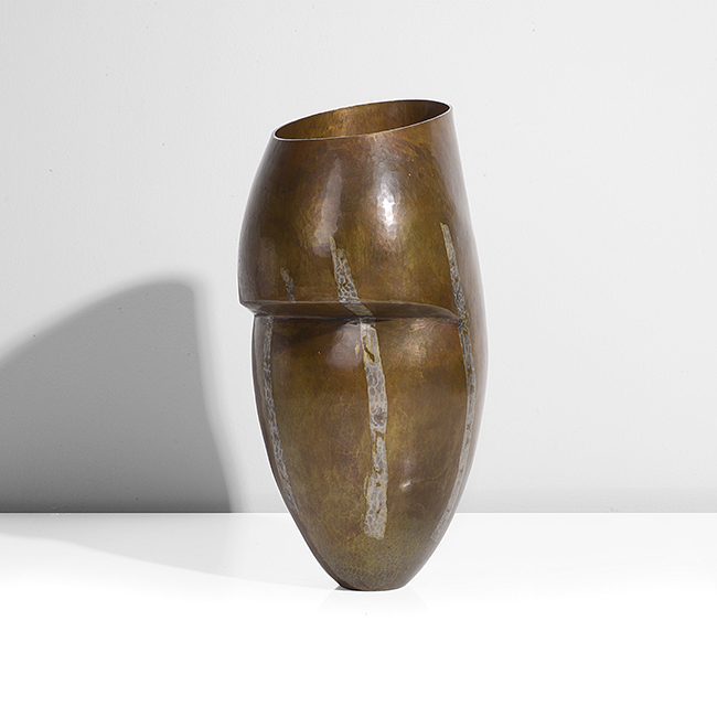 A copper and white metal asymmetric vessel made by Pete Stevens in 2004