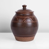 A brown stoneware lidded jar made by Norah Braden in circa 1935 sold at auction by Maak Contemporary Ceramics