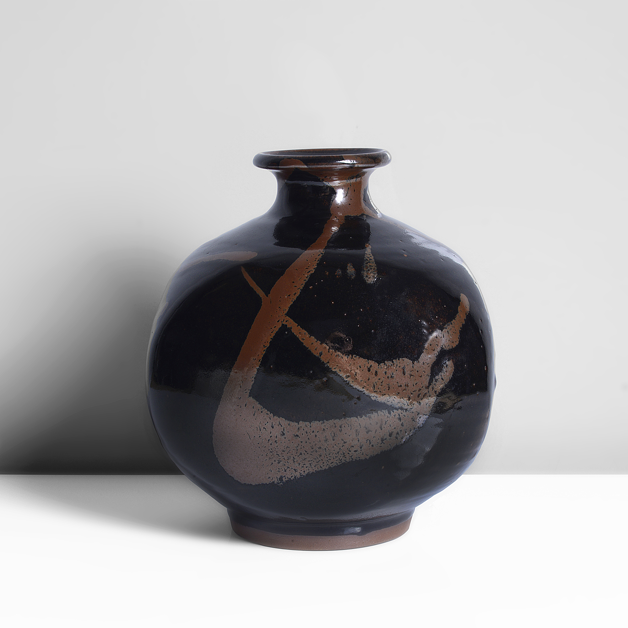 A tenmoku stoneware vase made by Japanese artist Ichino Shigeyoshi sold at auction by Maak