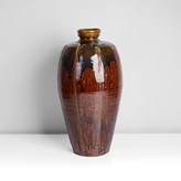 A burgundy stoneware vase made by Mike Dodd in circa 2014 sold at auction by Maak Contemporary Ceramics