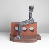 A raku 'Seated Figure' sculpture made by Mo Jupp in 2011 sold at auction by Maak Contemporary Ceramics