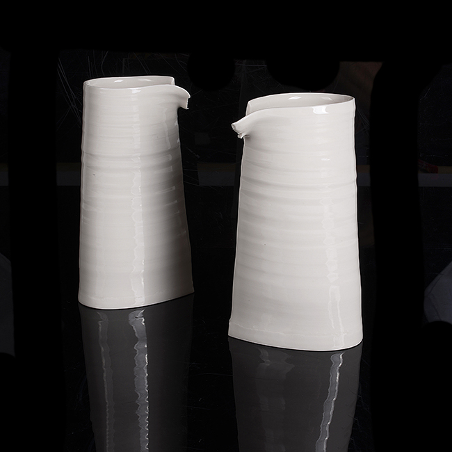 Two white porcelain vessels made by Carina Ciscato sold at auction by Maak Contemporary Ceramics