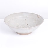 A pale grey stoneware bowl made by Gwyn Hanssen Pigott in circa 1975 sold at auction by Maak Contemporary Ceramics