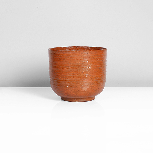 A terracotta earthenware pot made by Lucie Rie in circa 1930 sold at auction by Maak Contemporary Ceramics