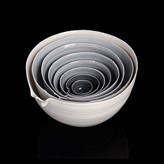 Eight cream and blue porcelain nesting bowls made by Carina Ciscato in circa 2009 sold at auction by Maak Contemporary Ceramics