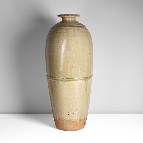 A green stoneware tall bottle made by Richard Batterham sold at auction by Maak Contemporary Ceramics