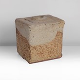 A brown stoneware cube form made by Ian Auld in circa 1972 sold at auction by Maak Contemporary Ceramics