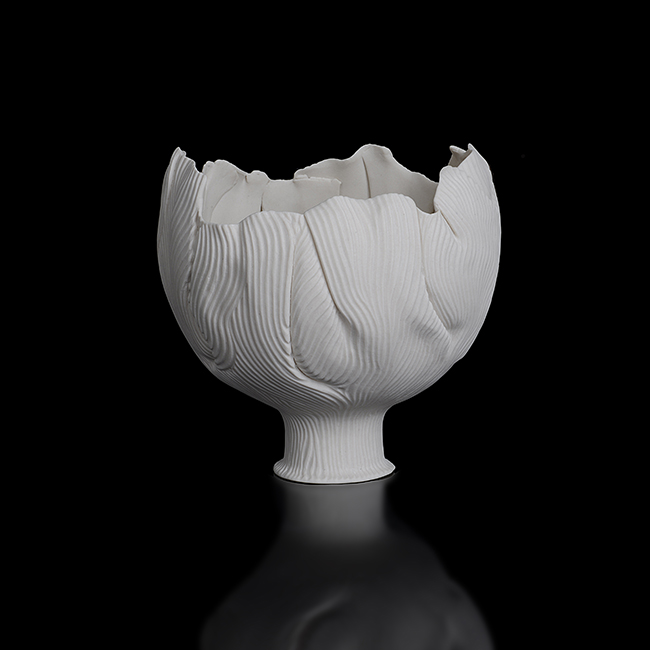 A white unglazed porcelain pinched form, 'Striated Crinoid', made by Mary Rogers in 1983 sold at auction by Maak Contemporary Ceramics