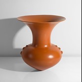 A terracotta earthenware vase made by Magdalene Odundo in 1991 sold at auction by Maak Contemporary Ceramics