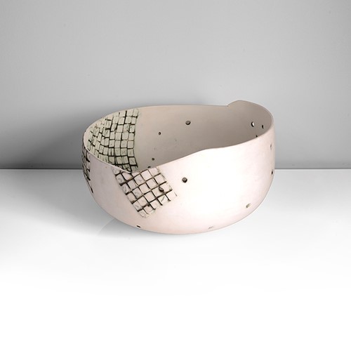 A white earthenware bowl made by Gordon Baldwin