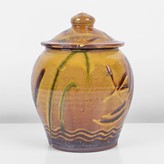 An ochre earthenware jar made by Clive Bowen sold at auction by Maak Contemporary Ceramics
