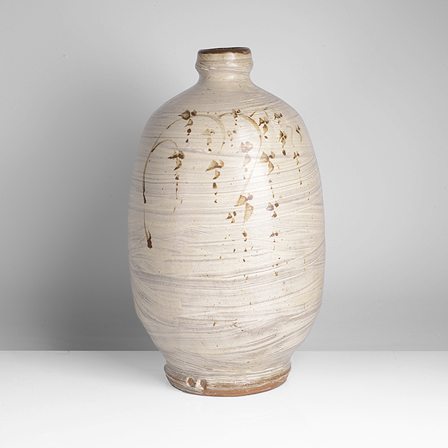 A brushed hakame stoneware bottle vase made by Jim Malone in circa 1993 sold at auction by Maak Contemporary Ceramics