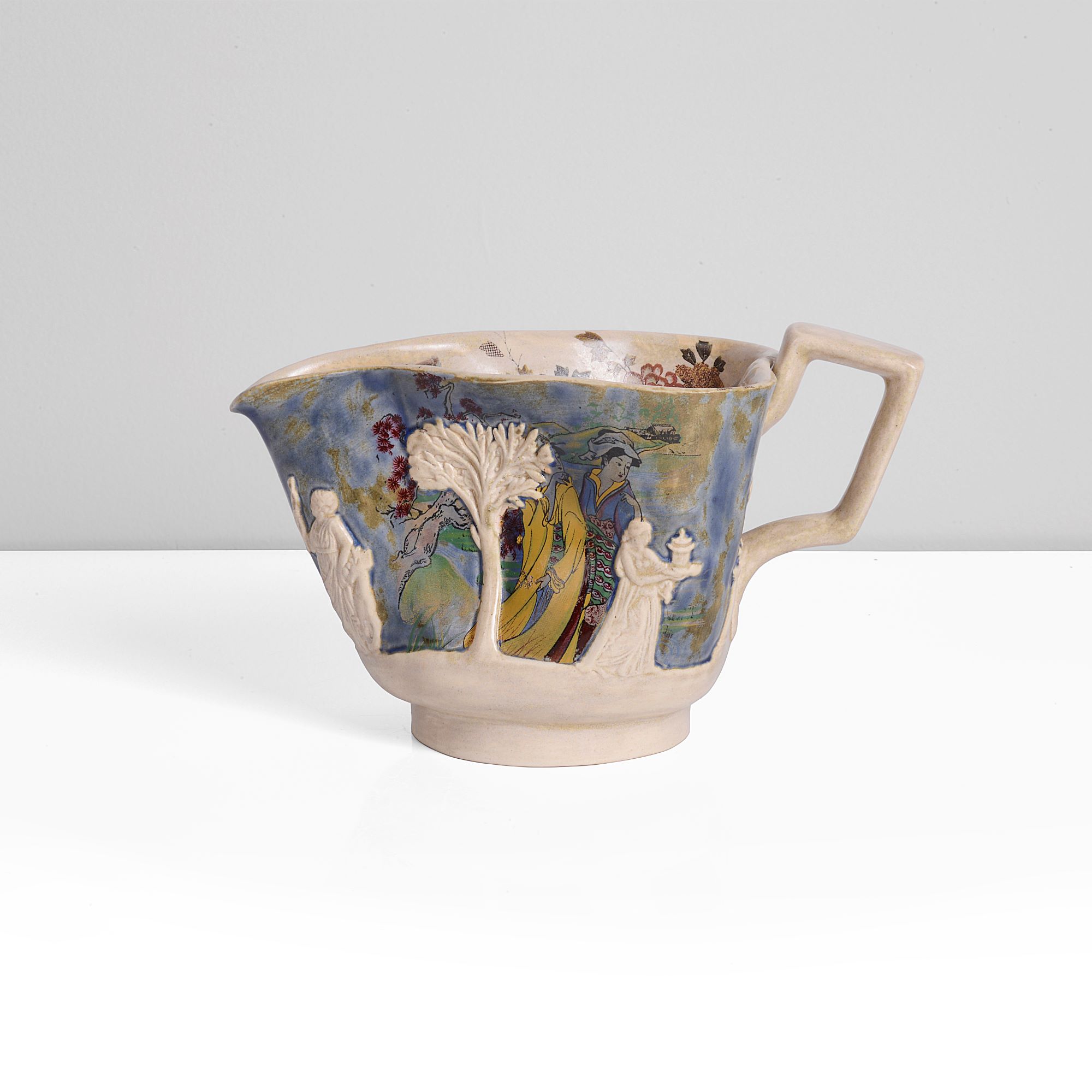 An earthenware jasperware jug made by Carol McNicoll in circa 1990 sold at auction by Maak