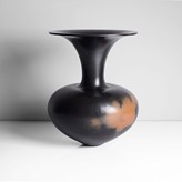 A black earthenware vessel made by Magdalene Odundo in 1989 sold at auction by Maak Contemporary Ceramics